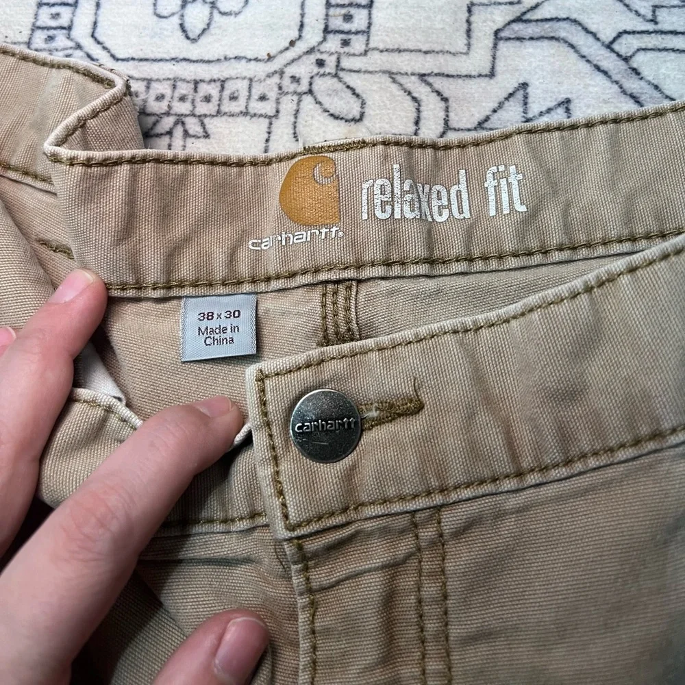 TWO pair of carhartt relaxed fit khakis - 38X30